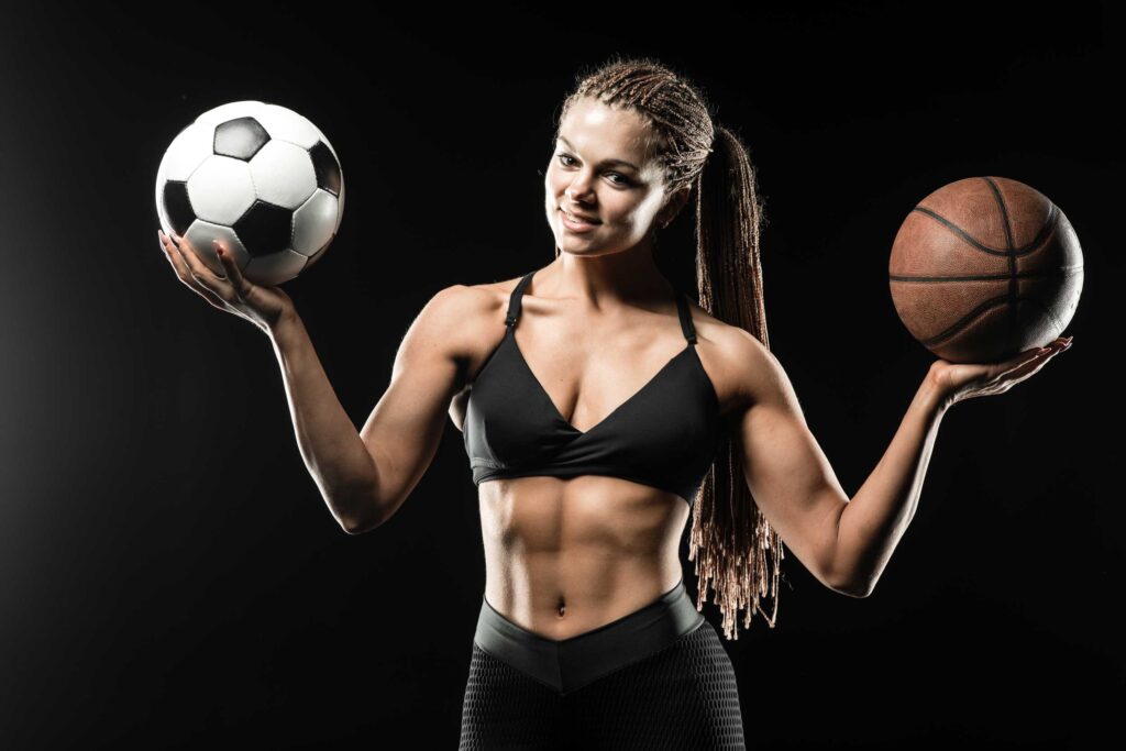 beautiful-smiling-fitness-girl-holding-a-basketbal